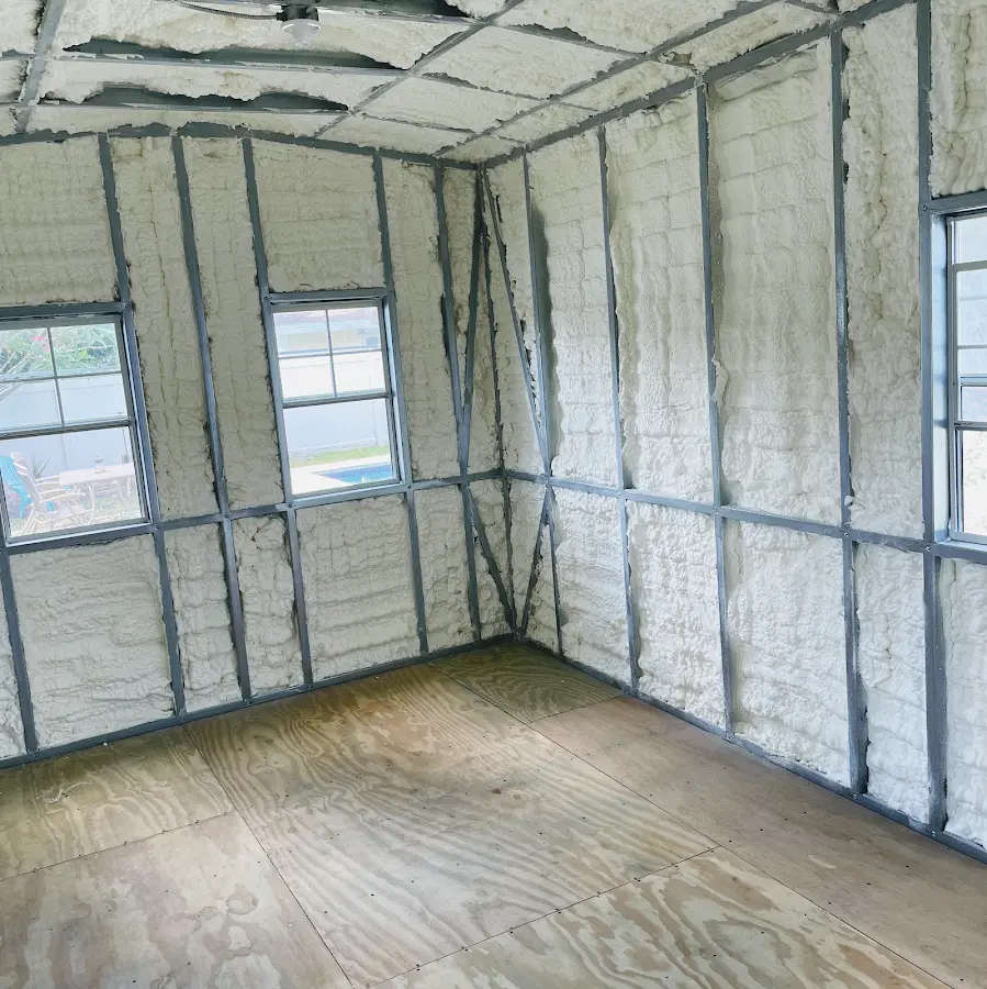 Closed-cell spray foam insulation applied to wall cavities in a residential project in Lindstrom